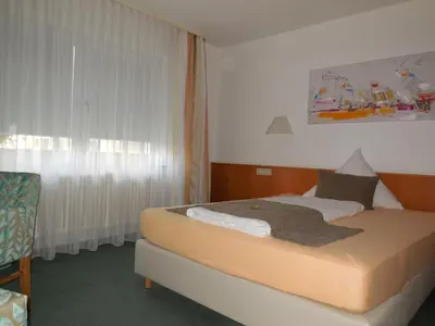 Ein Bett oder Betten in einem Zimmer der Unterkunft Hotel Schober