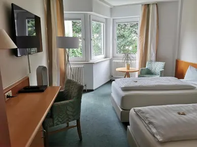 Ein Bett oder Betten in einem Zimmer der Unterkunft Hotel Schober