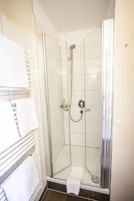 Ein Badezimmer in der Unterkunft Hotel Spessartstuben