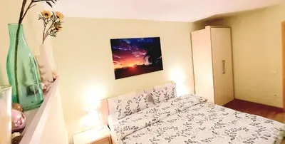 Ein Bett oder Betten in einem Zimmer der Unterkunft Gästehaus Röhm