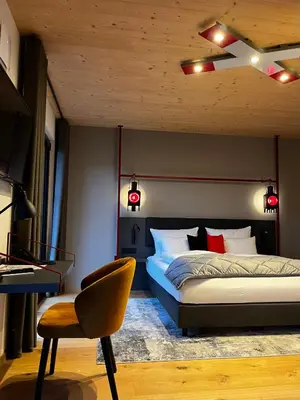 Ein Bett oder Betten in einem Zimmer der Unterkunft Ferienbahnhof Reichenbach