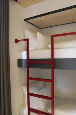 Ein Etagenbett oder Etagenbetten in einem Zimmer der Unterkunft Ferienbahnhof Reichenbach