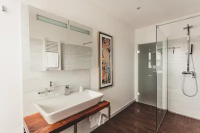 Ein Badezimmer in der Unterkunft O-Apartment
