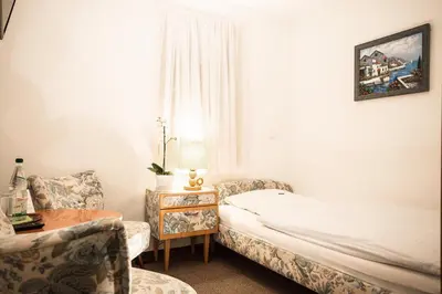 Ein Bett oder Betten in einem Zimmer der Unterkunft Hotel Wagner Am Marktplatz