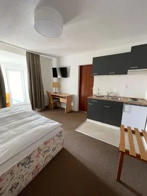 Ein Bett oder Betten in einem Zimmer der Unterkunft Hotel Wagner Am Marktplatz