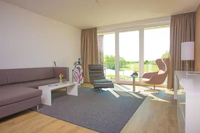 Ein Sitzbereich in der Unterkunft Hotel absolute
