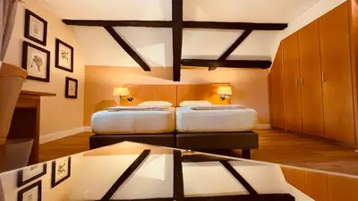 Ein Bett oder Betten in einem Zimmer der Unterkunft Salischer Hof