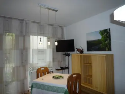 TV/Unterhaltungsangebot in der Unterkunft biozertifiziertes Hotel Höpfigheimer Hof mit Wein-Shop