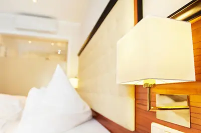 Ein Bett oder Betten in einem Zimmer der Unterkunft Naturhotel Rügers Forstgut