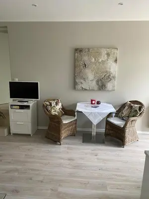 Ein Sitzbereich in der Unterkunft Apartment am Weinberg