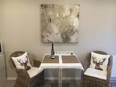Ein Sitzbereich in der Unterkunft Apartment am Weinberg