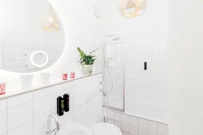 Ein Badezimmer in der Unterkunft Denner Hotel