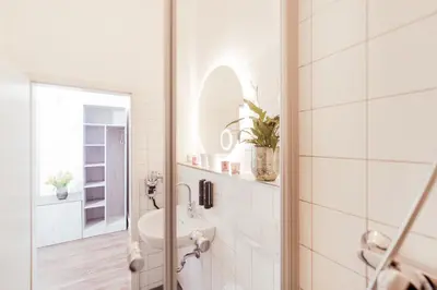 Ein Badezimmer in der Unterkunft Denner Hotel
