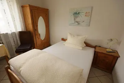 Ein Bett oder Betten in einem Zimmer der Unterkunft Hotel Linde