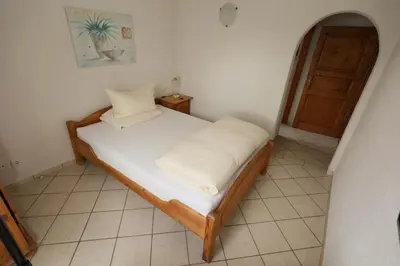 Ein Bett oder Betten in einem Zimmer der Unterkunft Hotel Linde