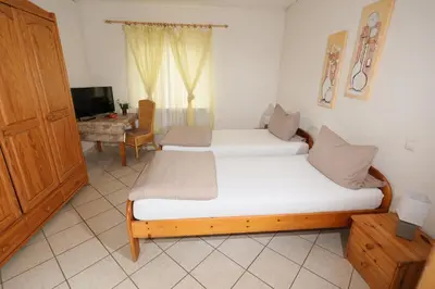 Ein Bett oder Betten in einem Zimmer der Unterkunft Hotel Linde