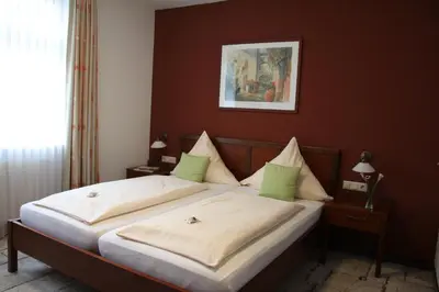 Ein Bett oder Betten in einem Zimmer der Unterkunft Hotel-Restaurant 1735