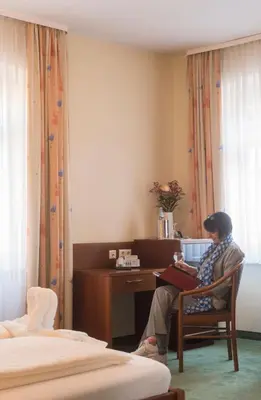 Ein Bett oder Betten in einem Zimmer der Unterkunft Hotel-Restaurant 1735