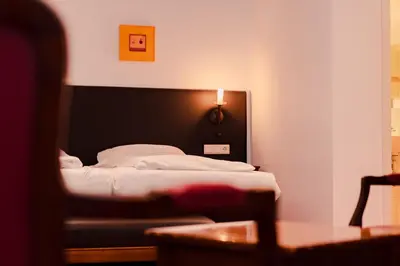 Ein Bett oder Betten in einem Zimmer der Unterkunft Hotel & Gasthaus Backmulde