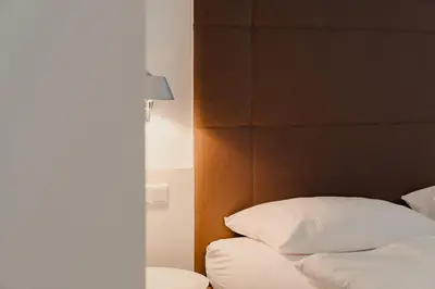 Ein Bett oder Betten in einem Zimmer der Unterkunft Hotel & Gasthaus Backmulde
