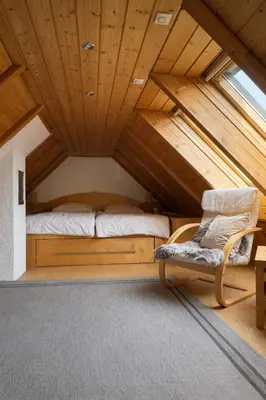 Ein Bett oder Betten in einem Zimmer der Unterkunft Haus am Südfrüchtegarten