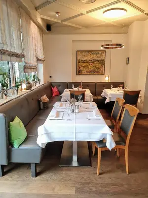 Ein Sitzbereich in der Unterkunft Hotel Restaurant Felix