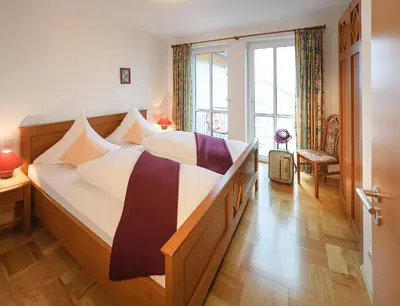 Ein Bett oder Betten in einem Zimmer der Unterkunft Weingut & Ferienwohnungen Müller-Kern