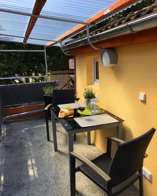 Ein Balkon oder eine Terrasse in der Unterkunft Ferienhaus Zur Mainpforte