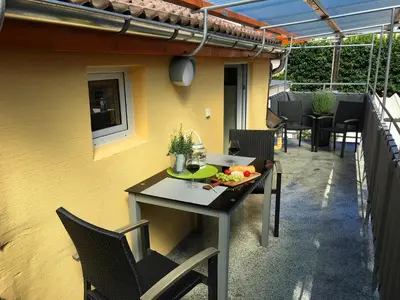 Ein Sitzbereich in der Unterkunft Ferienhaus Zur Mainpforte