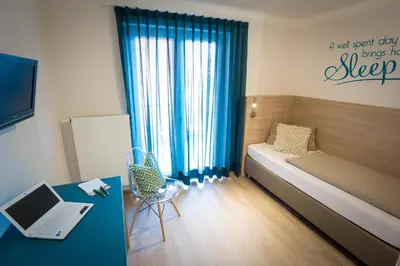 Ein Bett oder Betten in einem Zimmer der Unterkunft Hotel Landgasthof zum Kaffelstein
