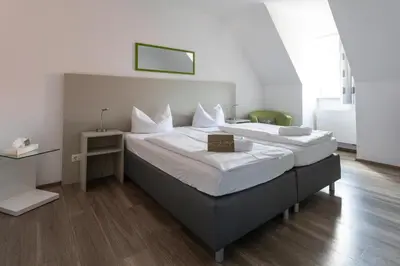 Ein Bett oder Betten in einem Zimmer der Unterkunft Hotel Landgasthof zum Kaffelstein