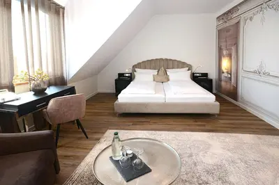 Ein Bett oder Betten in einem Zimmer der Unterkunft Landhotel Hauer