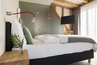 Ein Bett oder Betten in einem Zimmer der Unterkunft Landhotel Lammershof