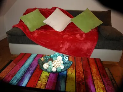 Ein Bett oder Betten in einem Zimmer der Unterkunft Ferienwohnung Klatschmohn