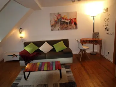 Ein Sitzbereich in der Unterkunft Ferienwohnung Klatschmohn