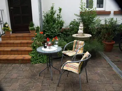 Ein Garten an der Unterkunft Ferienwohnung Klatschmohn