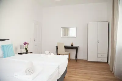 Ein Bett oder Betten in einem Zimmer der Unterkunft Apartment Haus Heidelberg