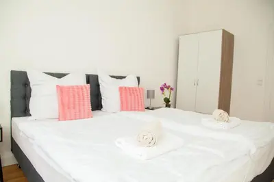 Ein Bett oder Betten in einem Zimmer der Unterkunft Apartment Haus Heidelberg