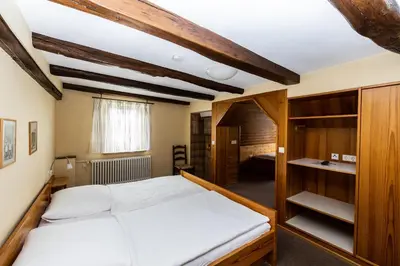 Ein Bett oder Betten in einem Zimmer der Unterkunft Gästehaus in der Brückenstraße Jagsthausen