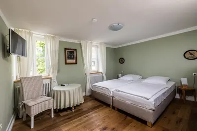 Ein Bett oder Betten in einem Zimmer der Unterkunft Gästehaus in der Brückenstraße Jagsthausen