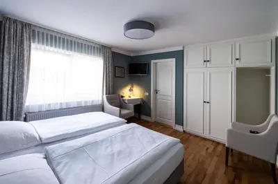 Ein Bett oder Betten in einem Zimmer der Unterkunft Gästehaus in der Brückenstraße Jagsthausen