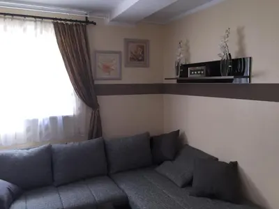 Ein Sitzbereich in der Unterkunft Boulevard Apartment