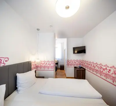 Ein Bett oder Betten in einem Zimmer der Unterkunft acor Boutique Hotel