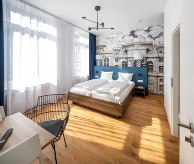 Ein Bett oder Betten in einem Zimmer der Unterkunft acor Boutique Hotel