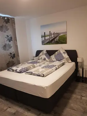 Ein Bett oder Betten in einem Zimmer der Unterkunft Sunny´s Hotel & Residence