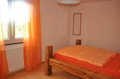 Ein Bett oder Betten in einem Zimmer der Unterkunft Punkrock Harbour Pension Bähr