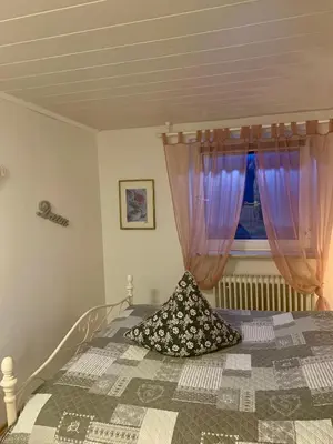 Ein Bett oder Betten in einem Zimmer der Unterkunft Lilo Luisa