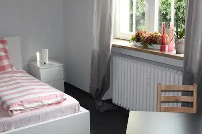 Ein Bett oder Betten in einem Zimmer der Unterkunft Bismarck Hostel Öhringen