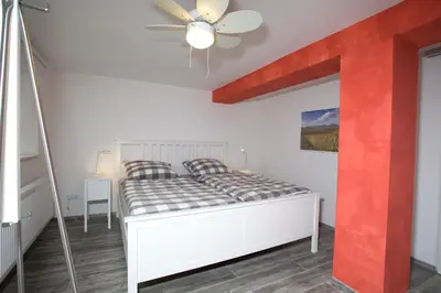 Ein Bett oder Betten in einem Zimmer der Unterkunft Haus am Markt, Neustadt an der Weinstraße