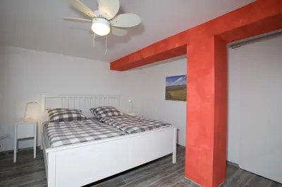 Ein Bett oder Betten in einem Zimmer der Unterkunft Haus am Markt, Neustadt an der Weinstraße
